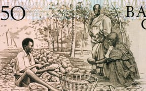 Men Splitting Cacao Pots on 50 Cedis 1980 Banknote from Ghana.
