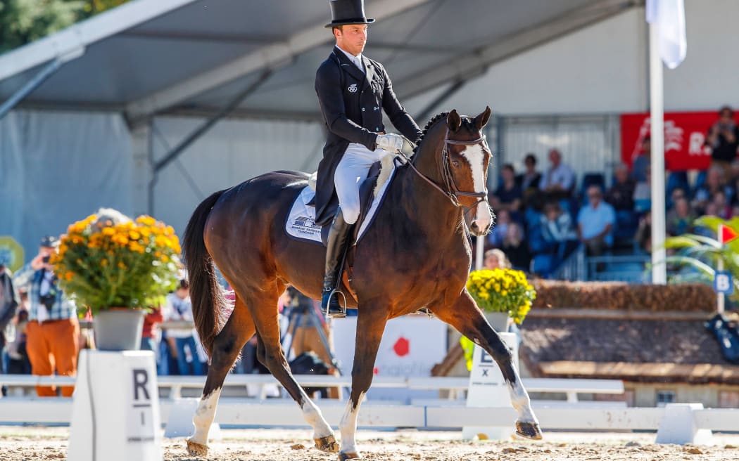 Tim Price and Wesko competing in Pau in 2019.