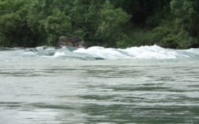 New white-water rapids in the Clutha River created by downpours around Central Otago.