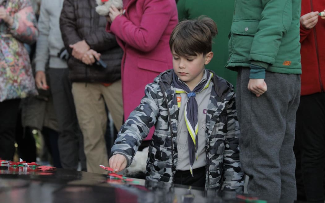 Anzac Day 2023 commemorations in Wellington.
People lay poppies at the conclusion of the dawn service.