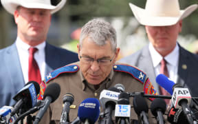 UVALDE, TEXAS - MAY 27: Steven C. McCraw, Director and Colonel of the Texas Department of Public Safety, speaks during a press conference about the mass shooting at Robb Elementary School on May 27, 2022 in Uvalde, Texas. McCraw held a press conference to give an update on the investigation into Tuesday's mass shooting where 19 children and two adults were killed at Robb Elementary School, and admitted that it was the wrong decision to wait and not breach the classroom door as soon as police officers were inside the elementary school.   Michael M. Santiago/Getty Images/AFP (Photo by Michael M. Santiago / GETTY IMAGES NORTH AMERICA / Getty Images via AFP)