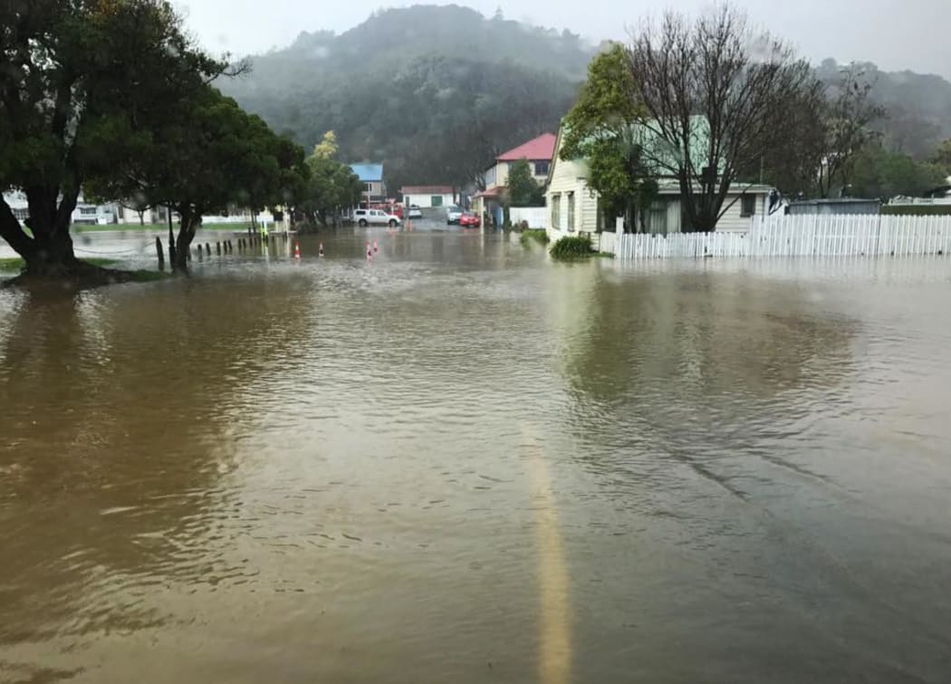 Akaroa has bore the brunt of wet weather in the Christchurch region as flooding and slips close roads.