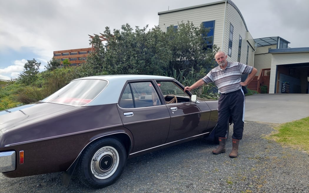 John Carter with one of his trademark Holdens used towards driving more than 2 million kilometres in his career - that's more than twice to the distance to the moon and back.