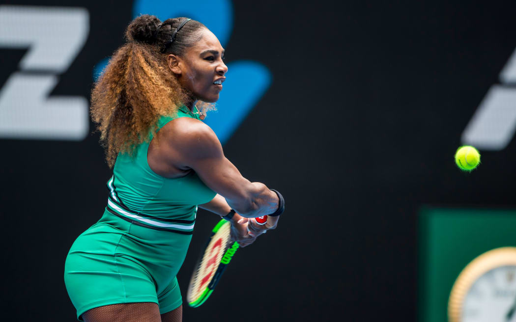 Serena Williams leans into a backhand at the Australian Open.
