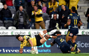 Ardie Savea of the Hurricanes scores a try against the Highlanders