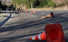 Cones left lying on the road - locals have seen them lying here for a long time