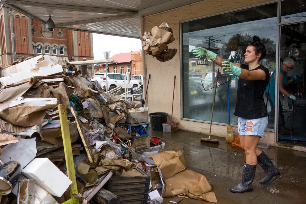The cleanup begins in central Lismore in the wake of flooding as ex-cyclone Debbie made its way south across the country.