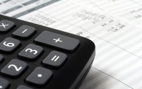 Euro Pay slip and calculator, close up for payroll or salary background