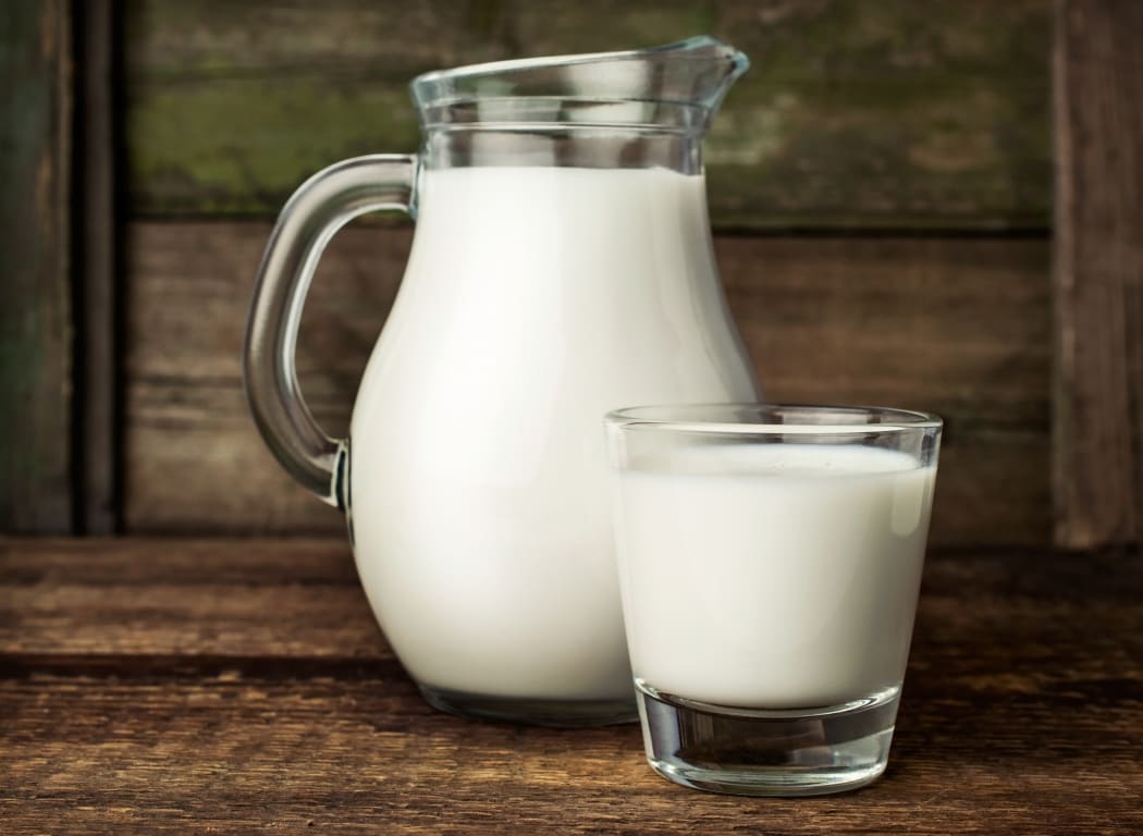 Milk in glass jug.