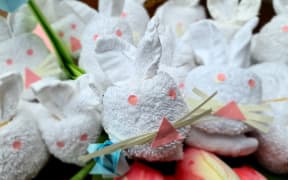 Easter bunnies made from face cloths in isolation hotels.