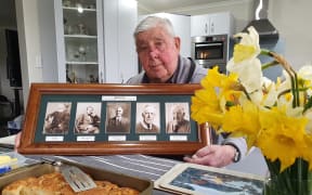 Dick Booth of Middlerun Farm with photos of his forebears who planted the daffodils the property is famous for