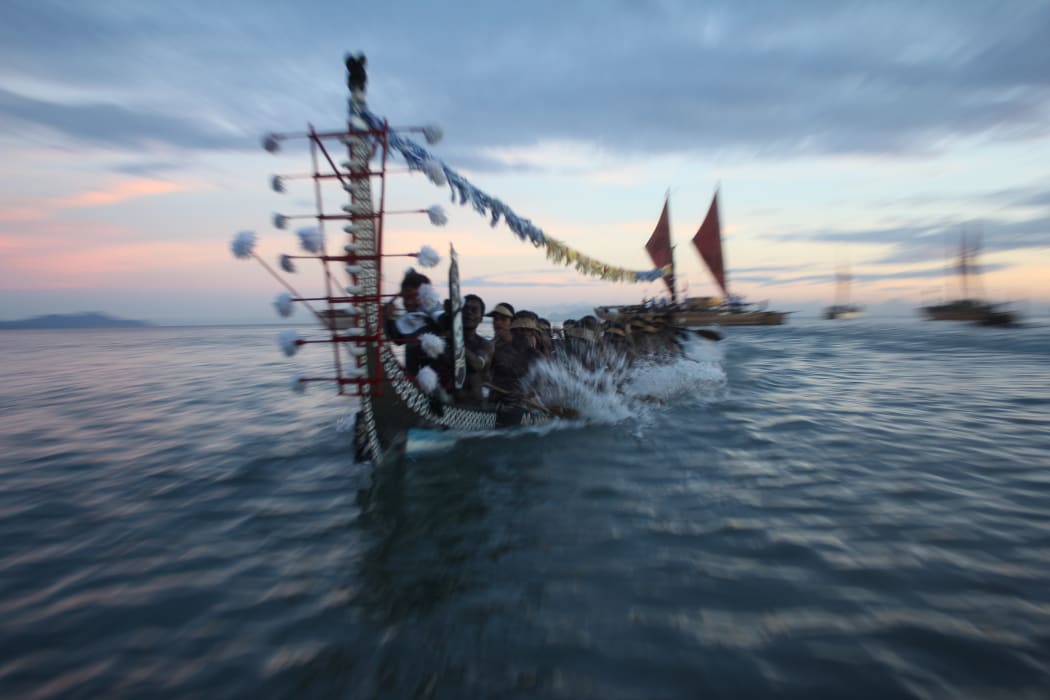 A traditional war canoe, Tomoko, from Roviana in the Western Solomons participates in the Pacific flotilla at the opening of the 11th Festival of Pacific Arts in Honiara. June 2012
