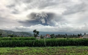Mount Agung spews ash into the sky on 27 November.