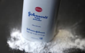 A container of Johnson's baby powder made by Johnson & Johnson.