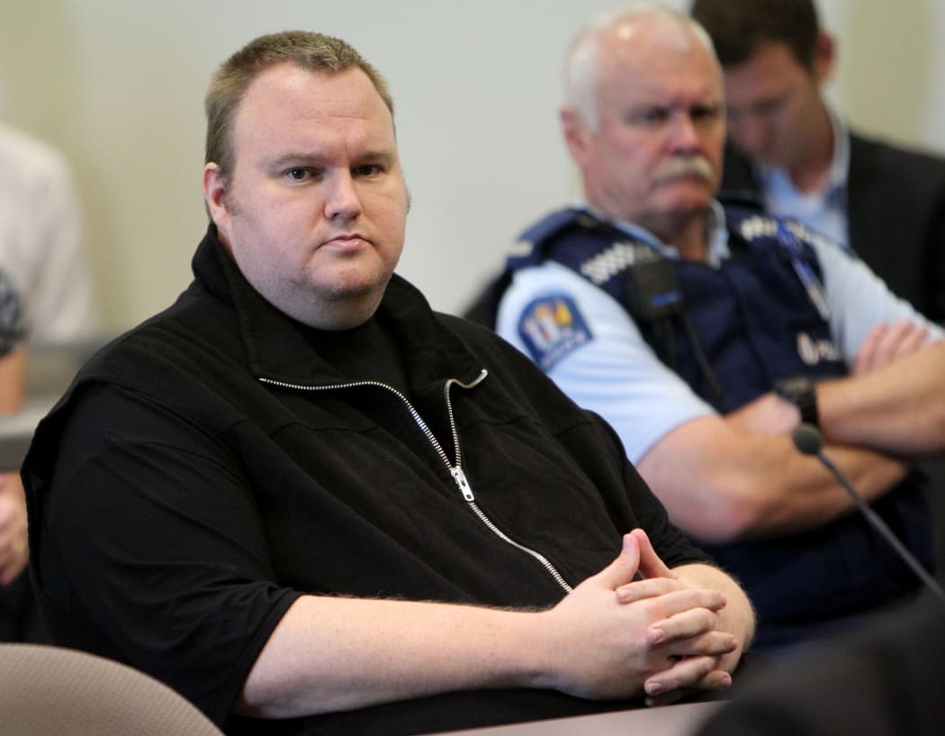 Kim Dotcom looks as he is granted bail in the North Shore District Court in Auckland on 22 February 2012.