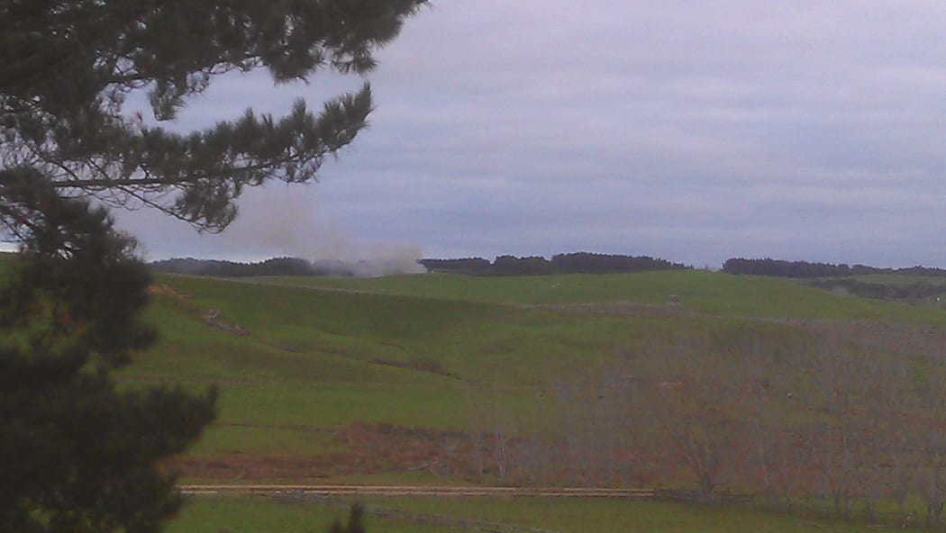 Smoke rising from the direction of Spring Hill prison.