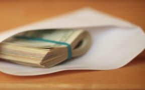 An envelope of cash