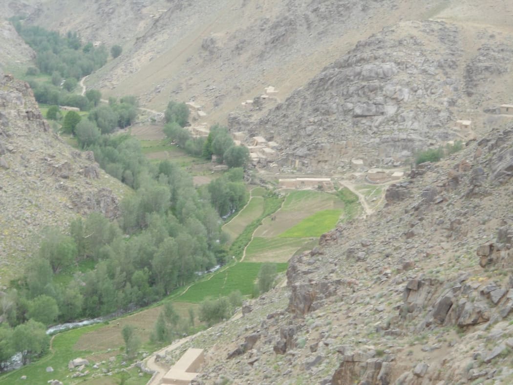 The authors said this photo showed the village of Naik in summer. They said the other village that was attacked was nearby, about 1km behind the ridge on the left of the photo.