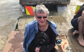 Ursula Mayo and her dog Poppy were rescued from floodwaters by Mrs Mayo's son-in-law Tautini Hahipene.
