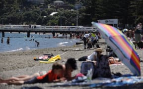 Beach goers in Wellington taking advantage of the hot weather.