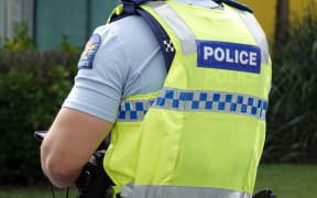 Auckland, New Zealand - December 24, 2020: Close up of a New Zealand police officer's uniform and badge