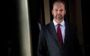 In this file photo taken on December 11, 2017 former Trump campaign official Rick Gates leaves Federal Court in Washington, DC.