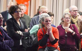 Supporters of Labor Party leader Bill Shorten look on as they follow results of the national election in Melbourne.