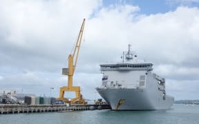 HMNZS Canterbury is being loaded at Devonport Naval base before heading to Fiji.