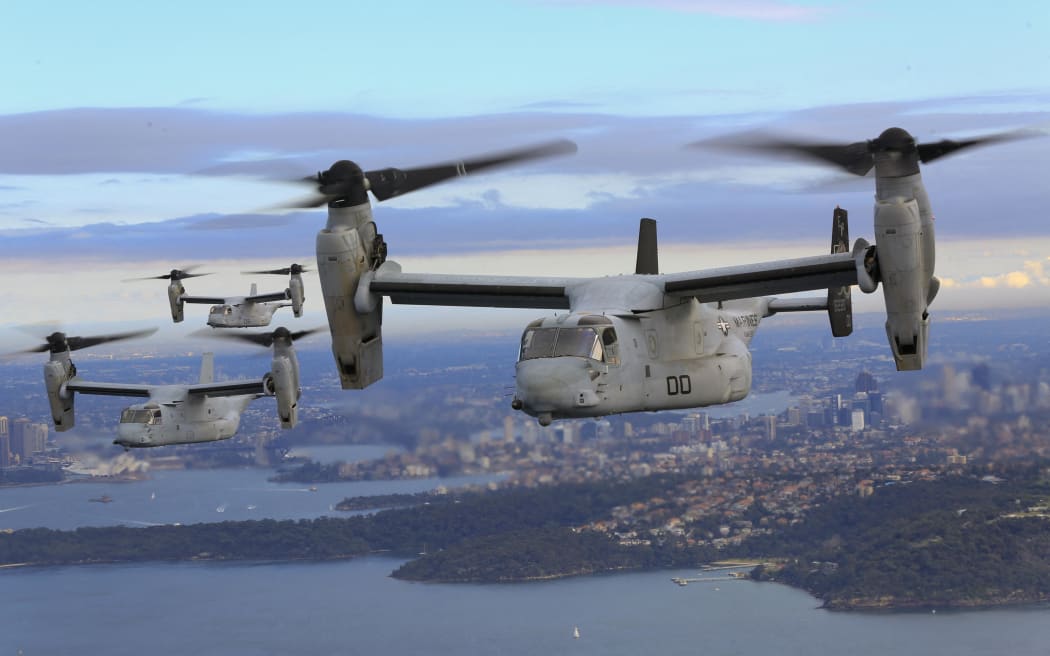 (FILES) This image obtained from the US Marine Corps shows three MV-22B Osprey tiltrotor aircrafts flying in formation above the Pacific Ocean off the coast of Sydney on June 29, 2017. A United States Osprey military aircraft crashed on a remote island north of Australia's mainland while taking part in war games on August 27, 2023, Australia's Defence Department said. (Photo by Amy PHAN / US MARINE CORPS / AFP) / RESTRICTED TO EDITORIAL USE - MANDATORY CREDIT "AFP PHOTO / US MARINE CORPS / Lance Cpl. Amy PHAN" - NO MARKETING NO ADVERTISING CAMPAIGNS - DISTRIBUTED AS A SERVICE TO CLIENTS