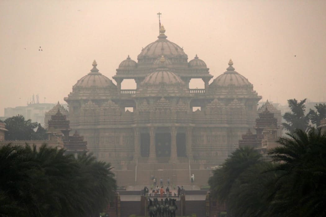 Akshardham temple amidst heavy smog in New Delhi on November 14, 2020. The air quality in Delhi and surrounding areas dipped to ''severe'' as people defied a ban on lighting Diwali firecrackers in several areas