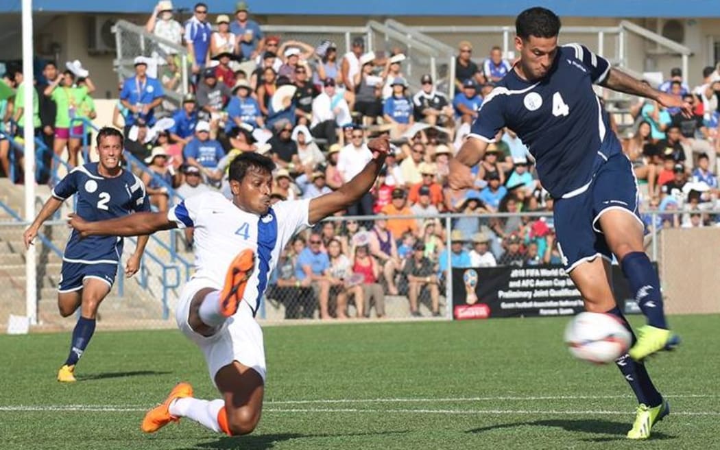 Guam's Travis Nicklaw attempts a shot in the Matao's 2-1 Football World Cup qualifying win over India.