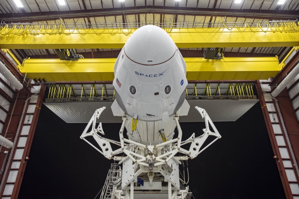 The Crew Dragon spacecraft and the SpaceX Falcon 9 rocket as preparations continue for the Demo-2 mission at NASA's Kennedy Space Center in Florida. - The Crew Dragon will take off from Kennedy on May 27 with help from SpaceX's Falcon 9 rocket and dock at the ISS.