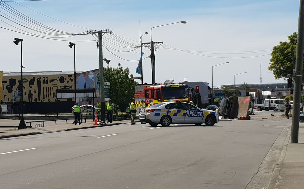 A four wheel drive lying on its side after it collided with a motorbike at the intersection of Colombo Street and Sandyford Street in Christchurch.