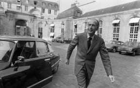 (FILES) This file photo taken on April 8, 1974 shows then presidential candidate Valery Giscard d'Estaing leaving the Hotel Matignon where he just announced his resignation as Finance Minister during the election campaign.