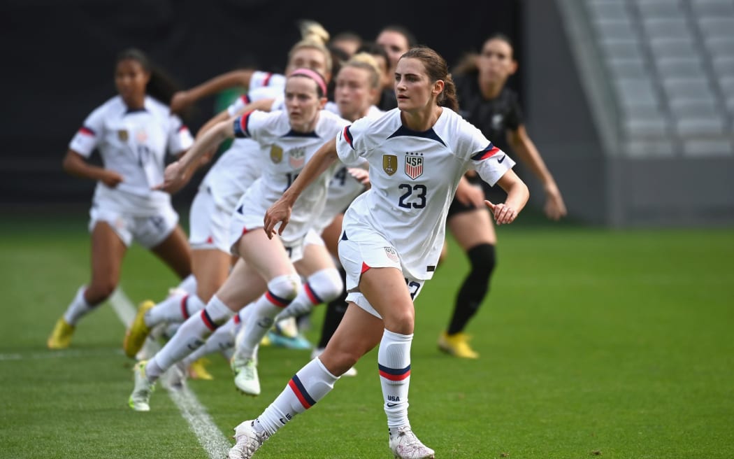 Emily Fox leads a lineup of US players during the international football friendly match against the Football Ferns at Eden Park.