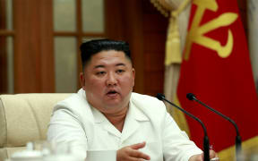 North Korean leader Kim Jong Un speaks during a meeting in Pyongyang on August 25, 2020.