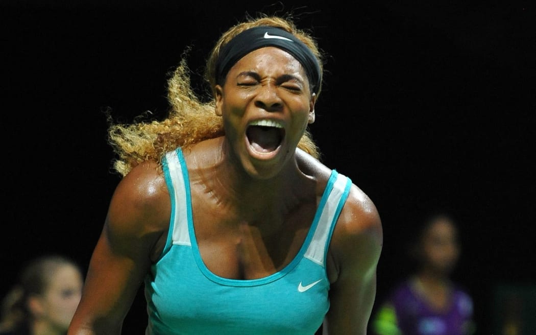 Serena Williams celebrates after winning a point in Singapore.