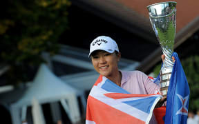 Lydia Ko with her trophy after winning the Evian Championship on September 13, 2015 in the French Alps town of Evian-les-Bains.