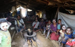 A group of people in one of the areas hit by the PNG earthquake