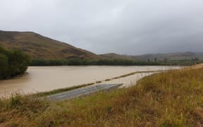 Flooded Taieri River in Central Otago.