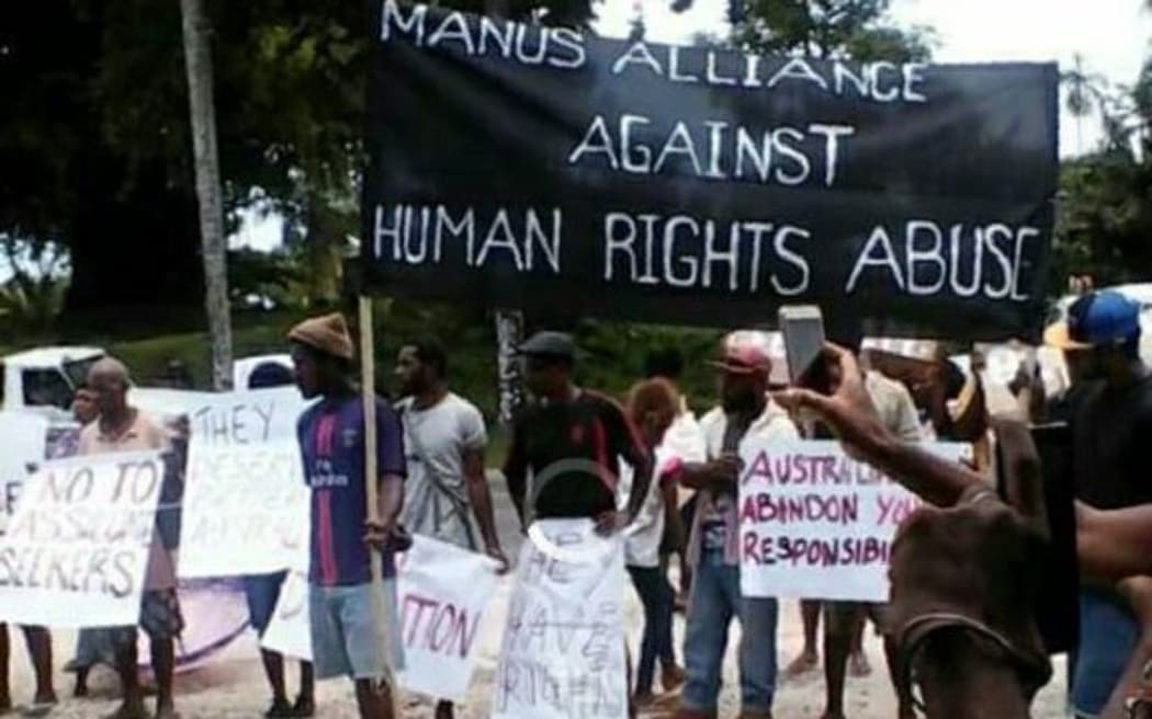 Local Manusians demonstrate in support of the refugees.