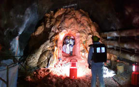 PRRA workers measuring the tunnel.