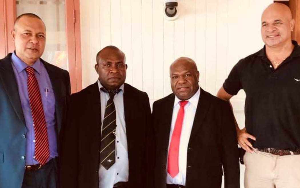 (From left:) Politicians Sam Basil, Kobby Bomareo, Mao Zeming and john Rosso at PNG's Government House for Mr Basil's swearing-in as a minister.