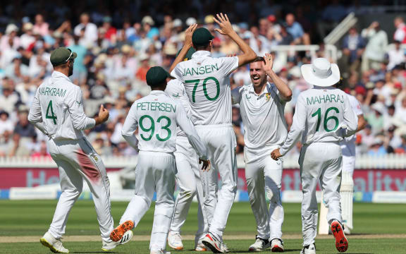 South Africa's Anrich Nortje celebrates with teammates during the 2022 test series in England.