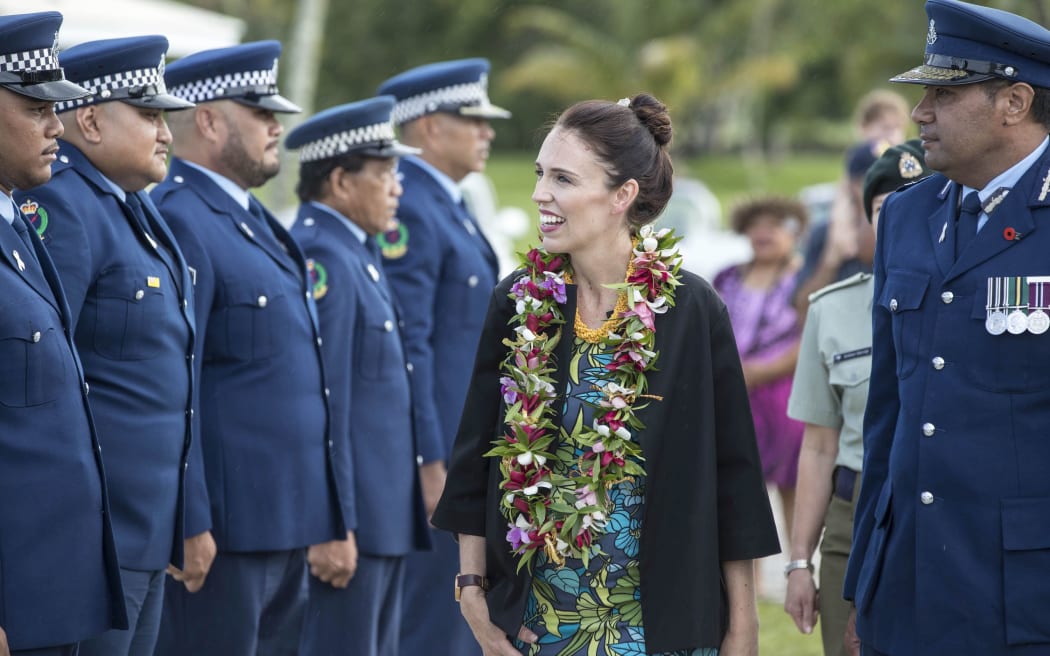 Jacinda Ardern inspects a police Guard of Honour during her visit to Niue.