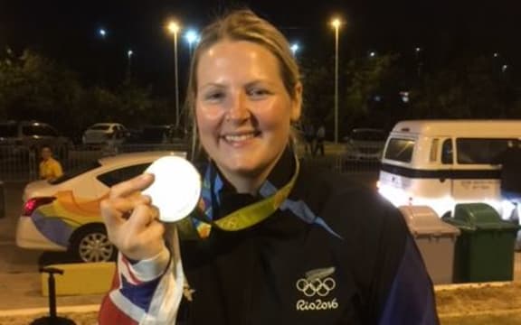 Olympic shooter Natalie Rooney with the silver medal she won in Rio.