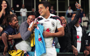 Jarryd Hayne is embraced by Fiji fans during the 2008 Rugby League World Cup.