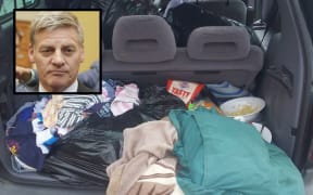 Bill English, boot of car being lived in.