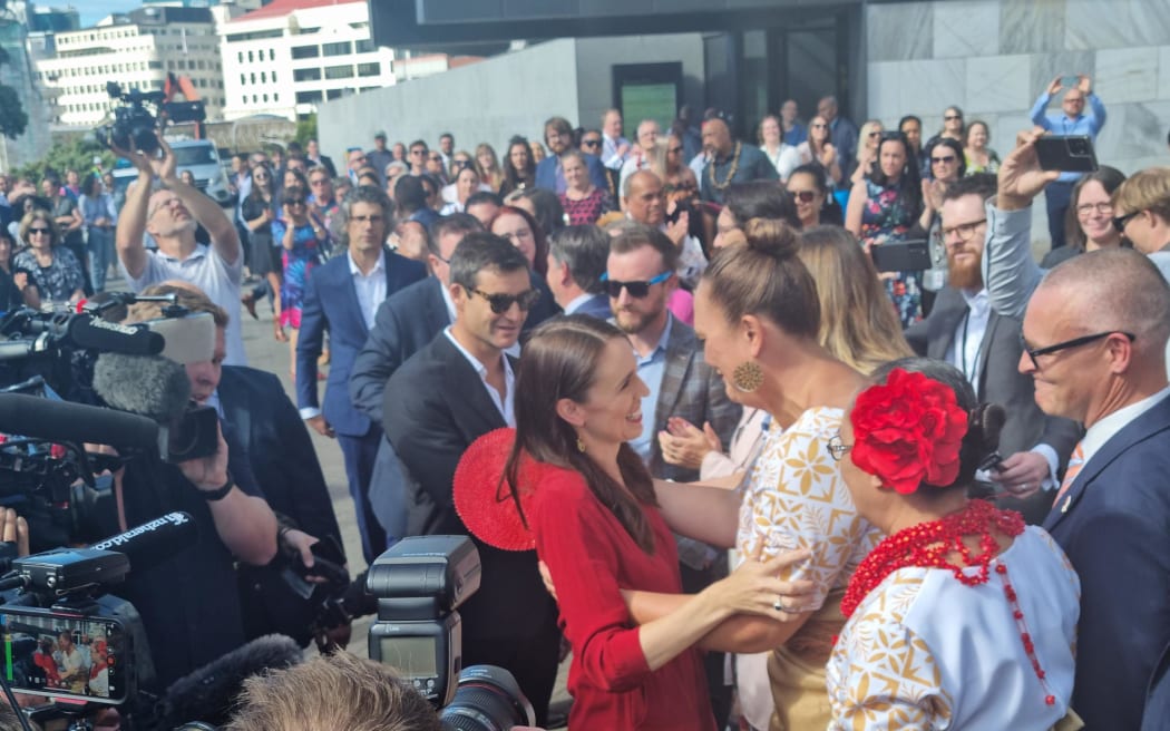 Jacinda Ardern exits Parliament for the final time as prime minister of New Zealand, greeted by fellow MPs, staff and onlookers.