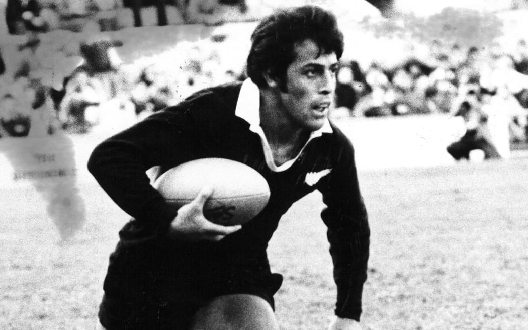 A close up black and white shot of former All Black, Bryan Williams